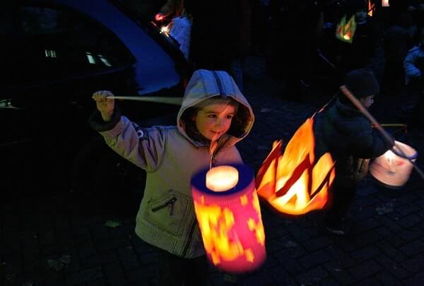 child with lantern