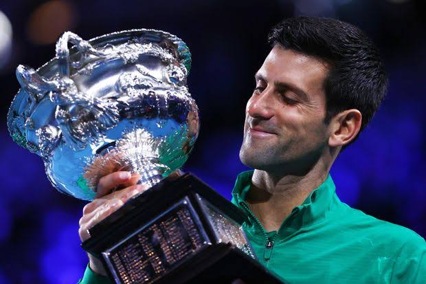 Aus Open: Djokovic wins 8th title with five-set win over Thiem
