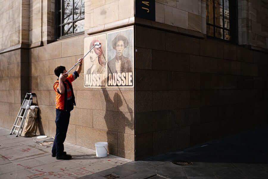 peter drew putting up posters