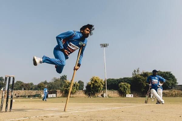 a physically challenged cricketer bowling