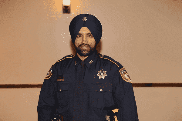 portrait of Deputy Sandeep Singh Dhaliwal in uniform.