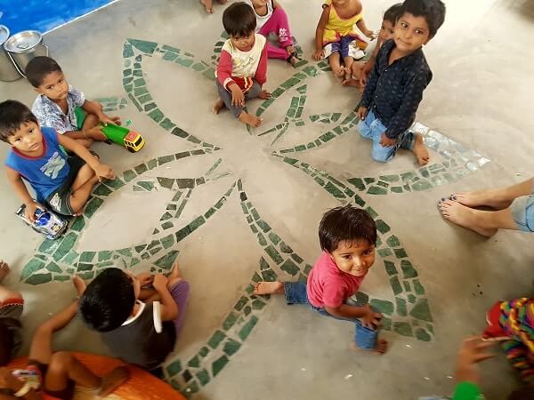 Children playing on the mosaic floor of Bholu 16