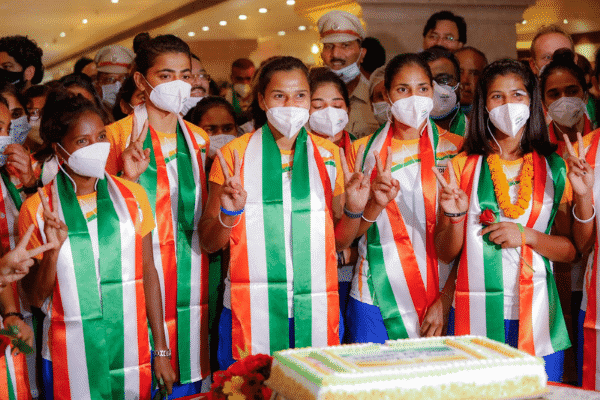 The national women's hockey team cutting a celebration cake at Hotel Ashoka after taking India to the semi-finals for the first time. Source: ANI