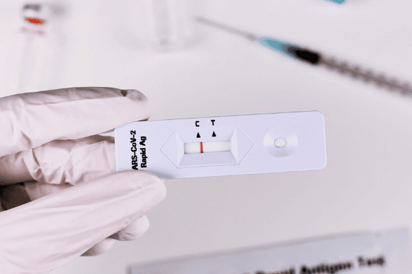 Rapid antigen tests look a bit like pregnancy tests. Source: Canva