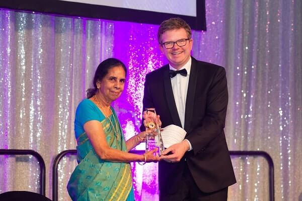 Dr Jaya Pathi receiving her SAIMA honour from SA Health Minister Chris Picton