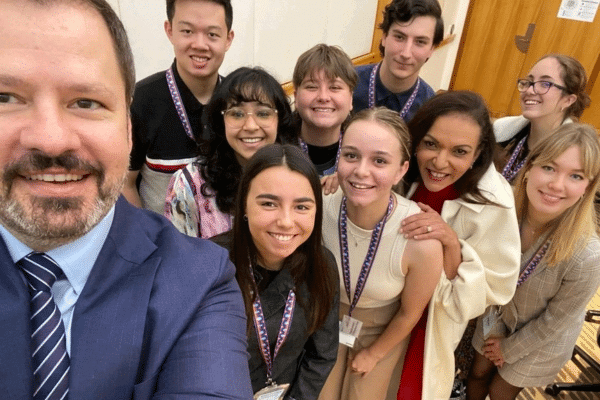 Aayushi and other board members pose for a selfie inside of Parliament house in Canberra