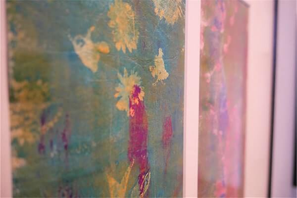 an extreme close up of a printmaking piece by Manasee Jog; colours and textures are visible. 