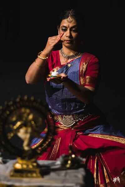Indian bharathanatyam dancer in krishna pose or gesture with eye closed at  stage during performance - concept of indian culture, traditional dress and  Stock Photo - Alamy