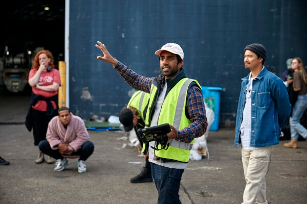 Renny Wijeyamohan directs his actors on set for The Disposables.