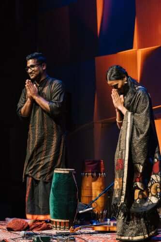 Bhairavi and Nanthesh give namaskars to the audience as they receive applause, during their Melbourne Recital Centre concert. Bhairavi and Nanthesh