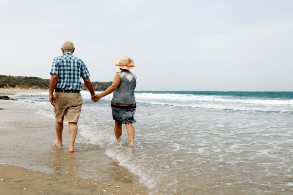 Elderly couple on beach