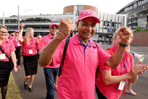 Prabodh Malhotra in pink clothes on his walk to the SCG