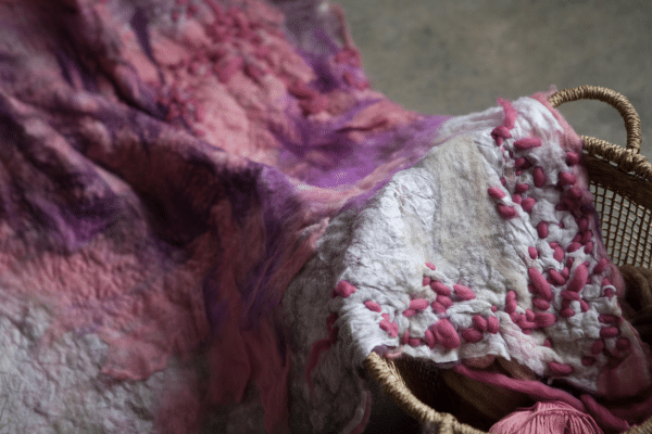 Close up of a purple and white cloak