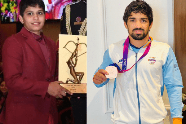 Antim Panghal and Aman Sehrawat both pose with awards