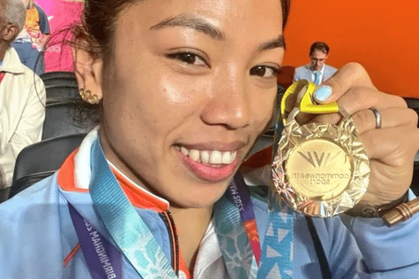 Mirabai Chanu poses with medal