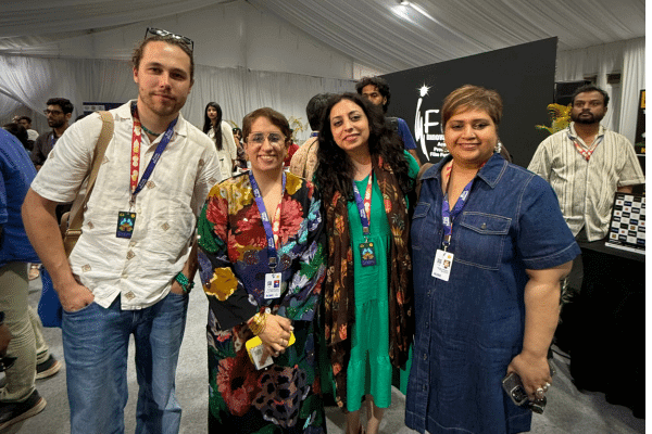 ana and team stand for a group photo at the film bazaar