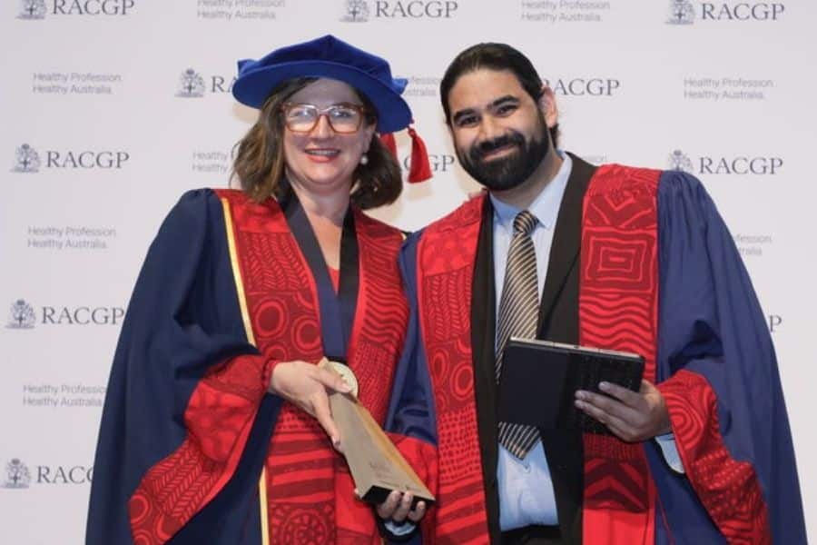 Dr Abhishek Verma receives his 2022 award from RACGP President Dr Nicole Higgins. (Source; RACGP)