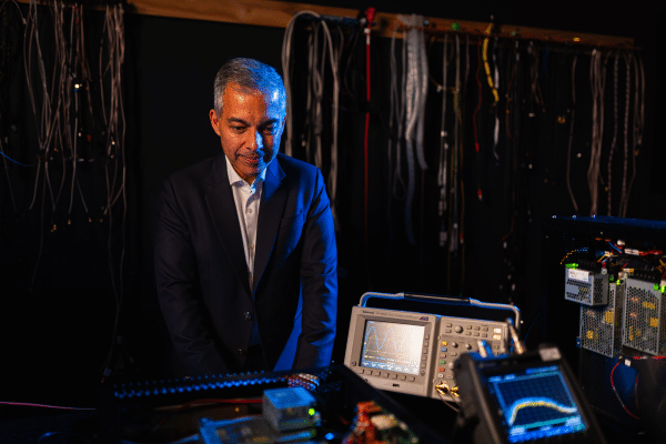 Dr Vikram Sharma, winner of the Prime Minister's Science Prize for Innovation using his equipment in his lab.