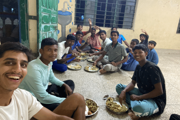 Sharing a meal with the leprosy colony children