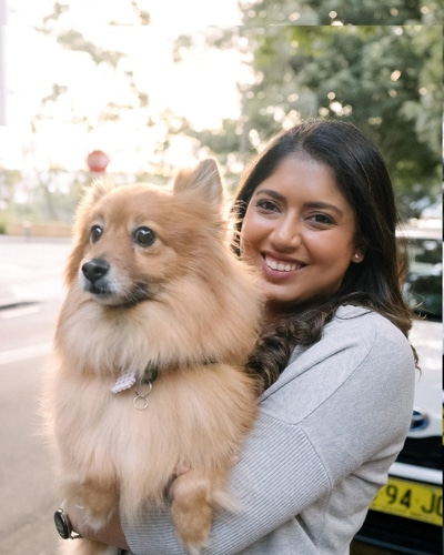 Drishti with her dog Loki the Pomeranian