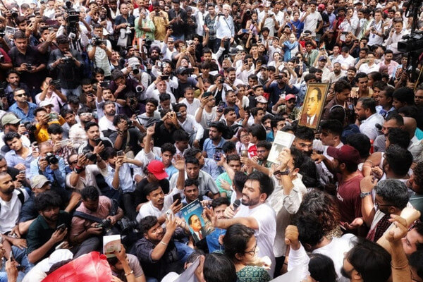 Abhijeet Dipke, head of the Cockroach Janta Party (CJP), speaks to supporters at a sit-in protest in New Delhi on June 6, 2026
