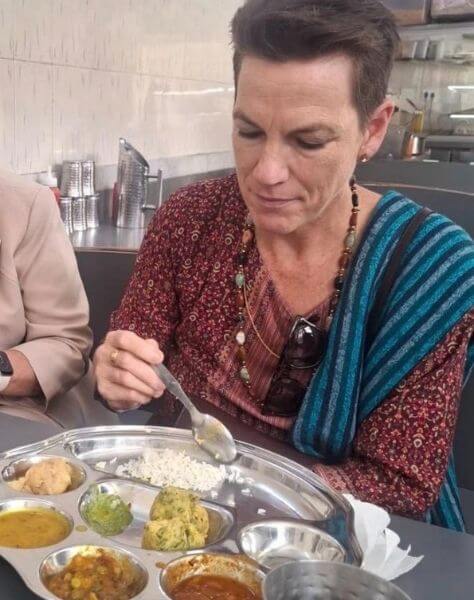 sandy eating indian thali